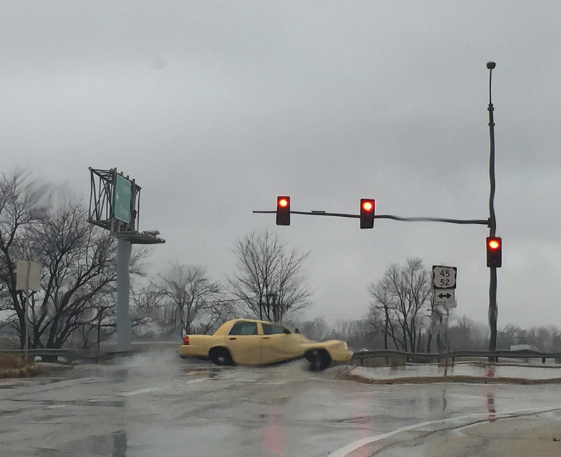 intersection with yellow car