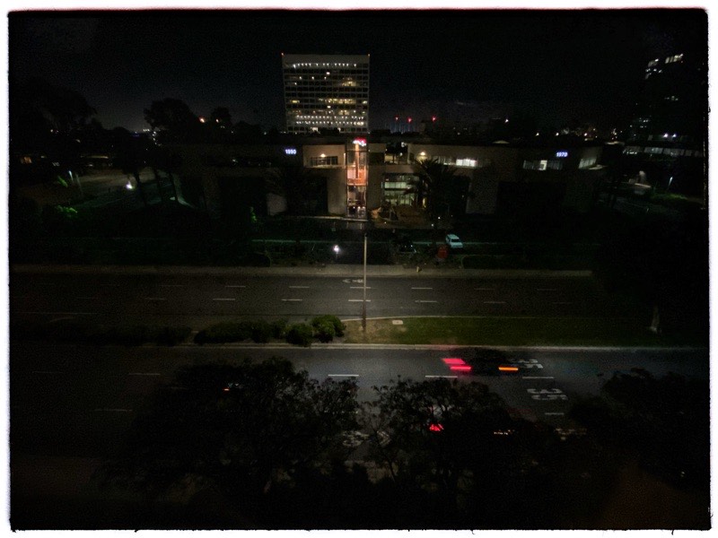 city lights of night out side hotel window
