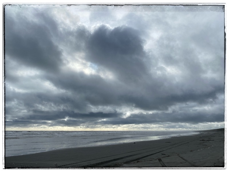 dark clouds over the beach