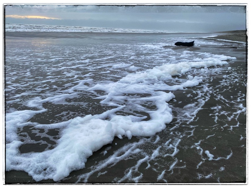 rough seas on the beach, west coast, new zealand. 