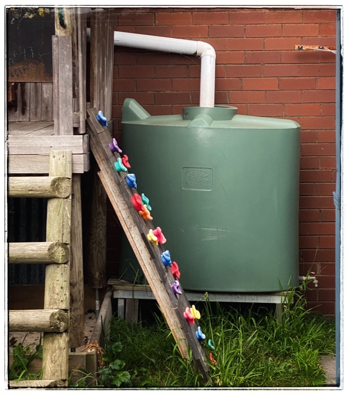 rainwater tank attached to play house roof