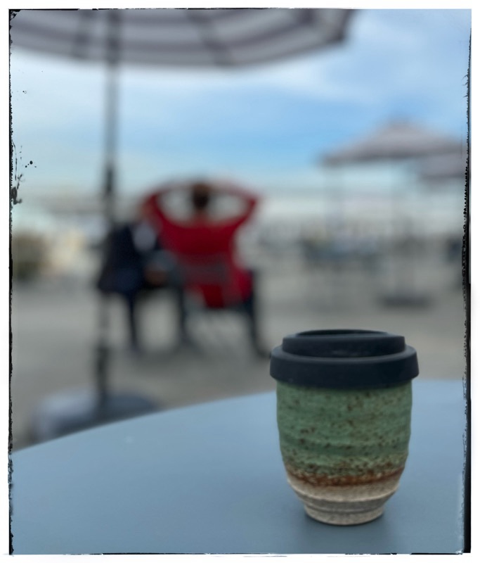 Pottery for The Planet cup on table. 