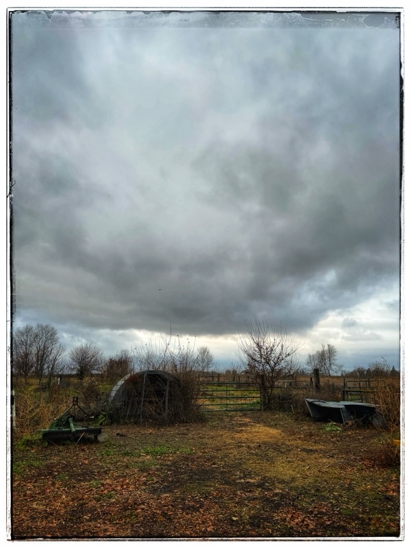 Rain clouds over farm 