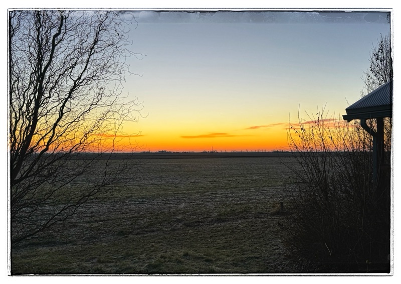 Sunrise over empty fields