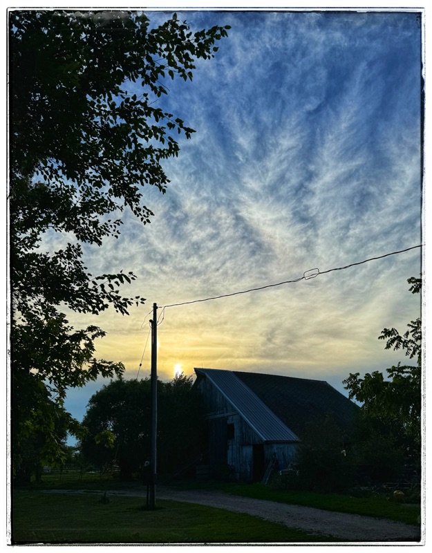Sunset over old barn 